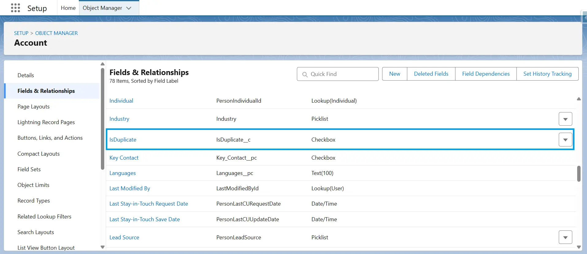 Salesforce Object Manager Fields & Relationships page for Account with custom IsDuplicate checkbox field highlighted.