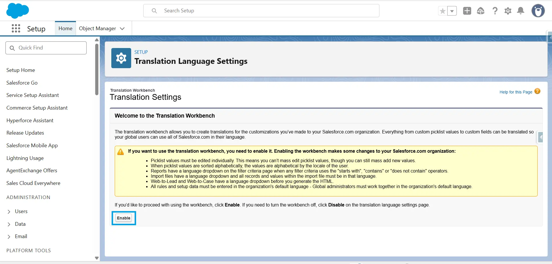 Salesforce Setup Translation Language Settings page with the Enable button highlighted to activate Translation Workbench.